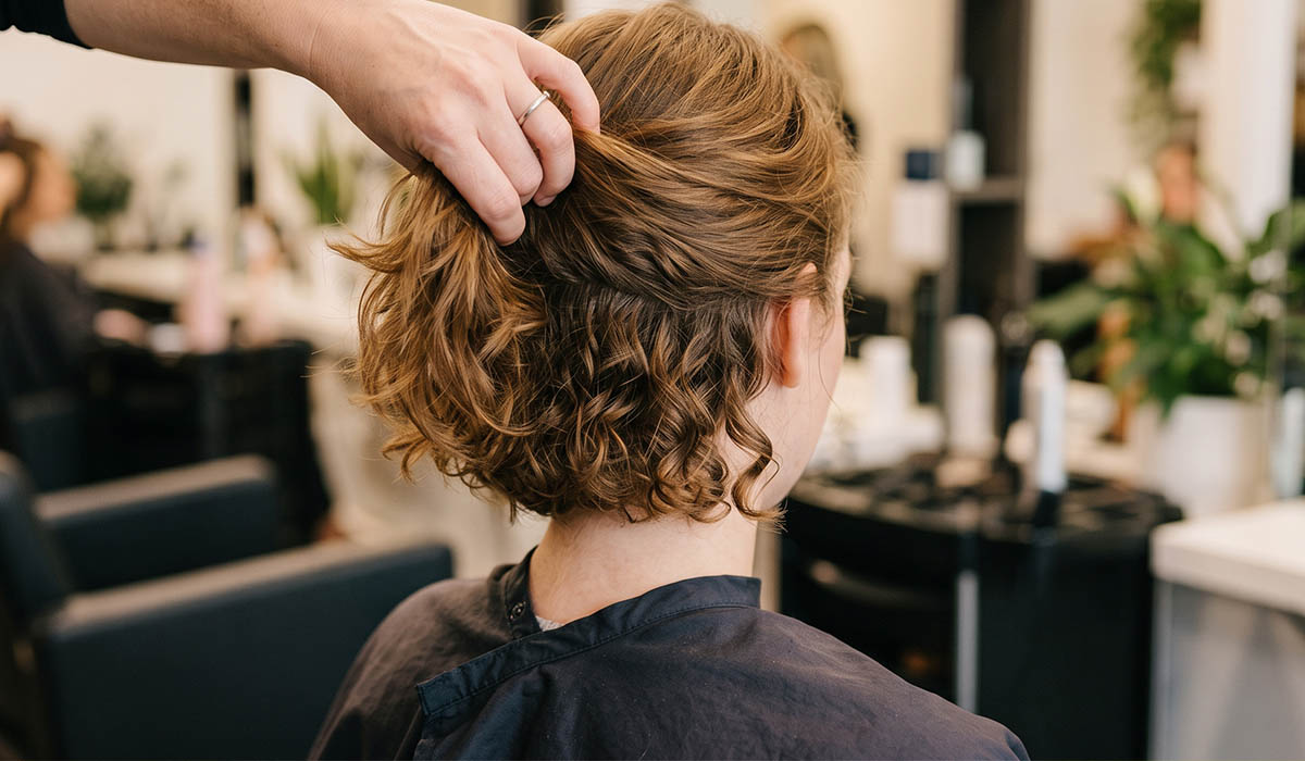 Why Is My Hair Curly Underneath but Straight on Top?
